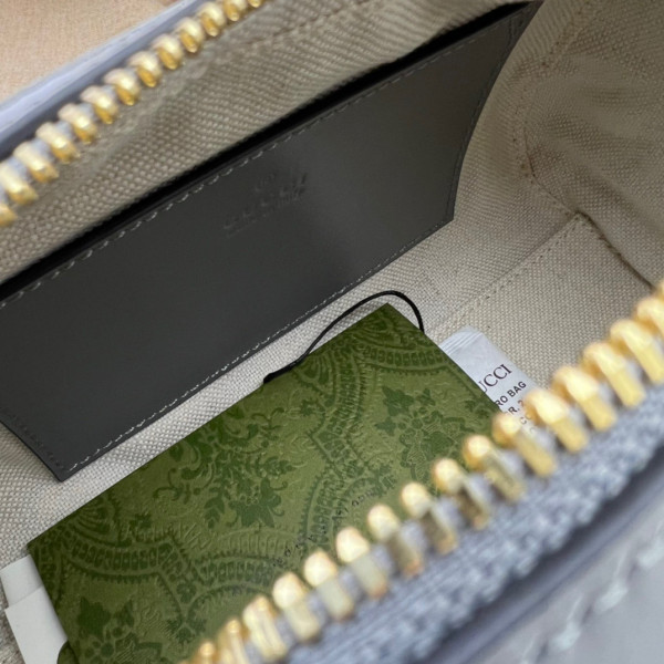 G*u*i gg matelassé leather top handle bag