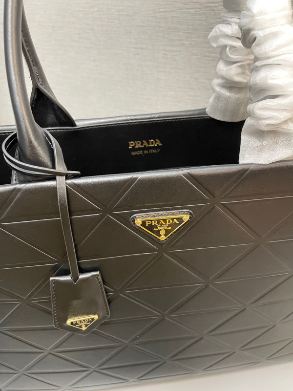 Pra*a symbole large leather bag $ 4,200